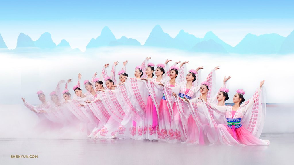 Shen Yun performers in traditional Chinese costumes on stage — founded by Falun Gong practitioners in New York, 2006