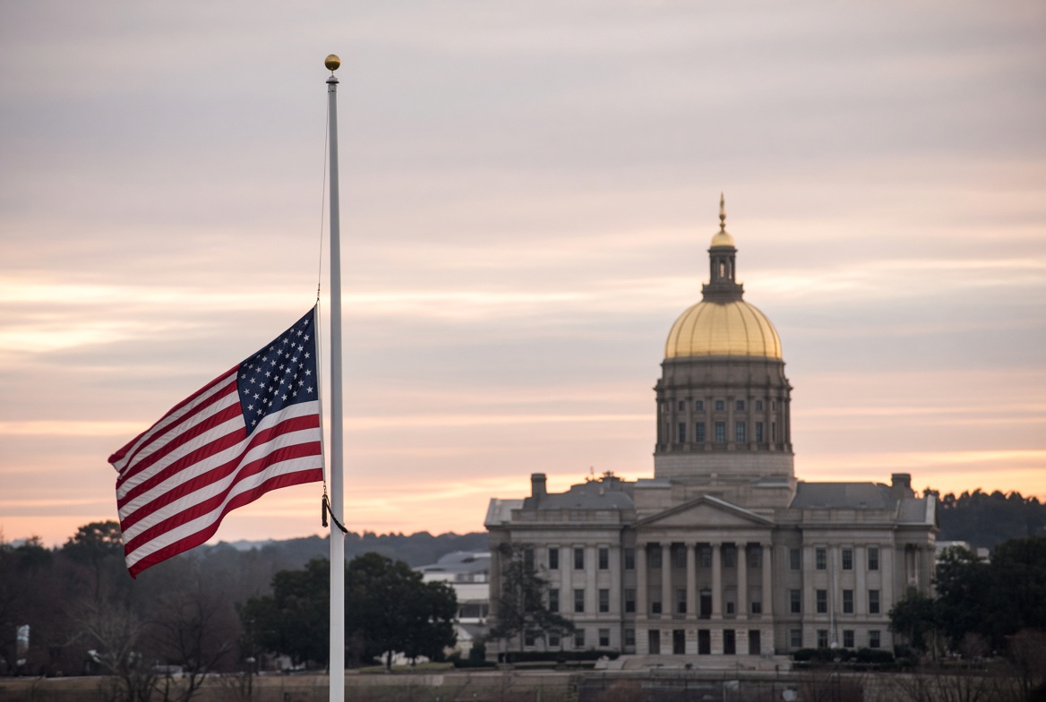 Why Are Flags at Half-Mast Today? Your State, Not Washington 2 US flag at half-mast in front of a state capitol – why are flags at half-mast today